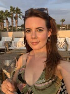 Traveler reflecting on burnout and personal travel transformation