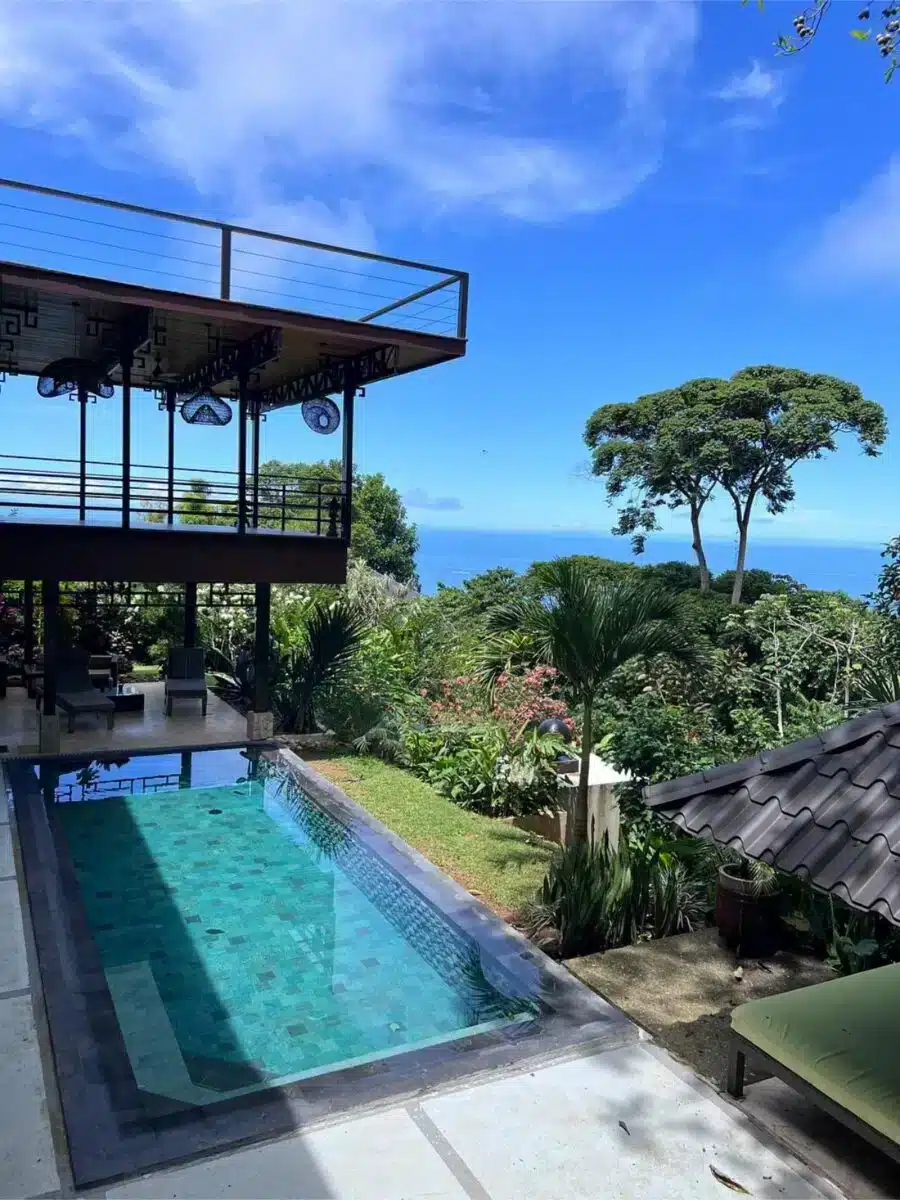 Multi-level luxury retreat villa with pool surrounded by tropical rainforest in Costa Rica