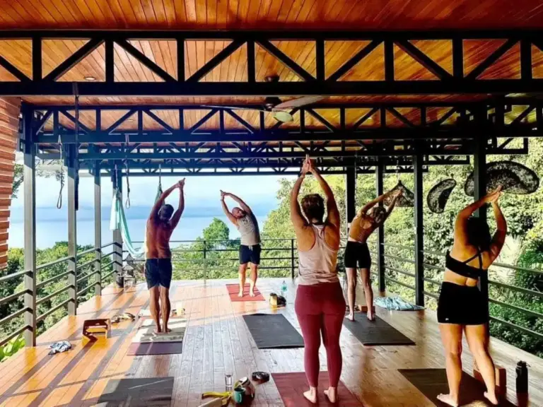 Coastal ocean view through open balcony doors at Soul Alive Retreats