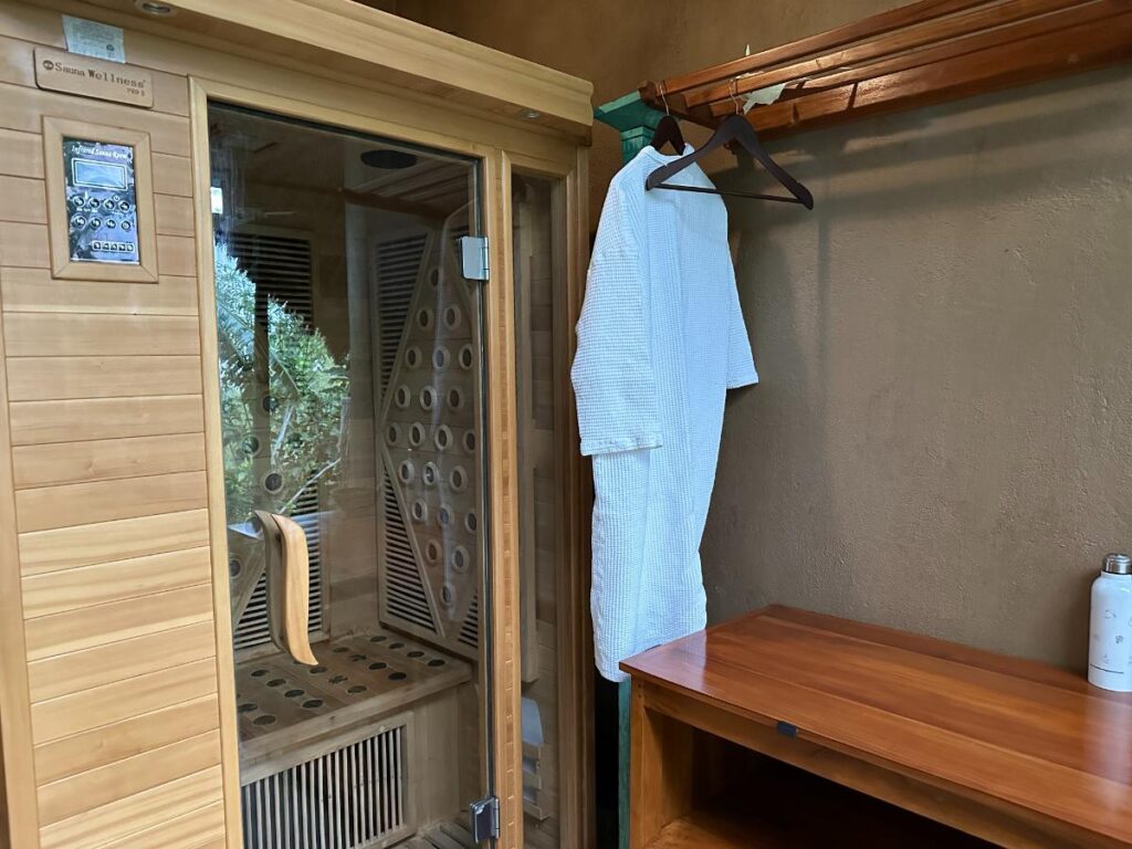 Spa relaxation area at Munduk Moding Plantation Bali with bamboo wall panels and small decorative plant arrangements