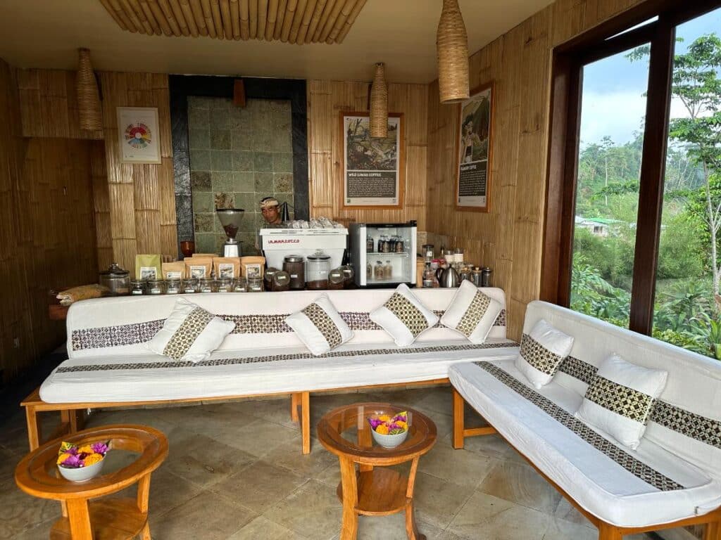 Coffee and tea station in the lobby lounge at Munduk Moding Plantation Bali with artisan coffee equipment and cups