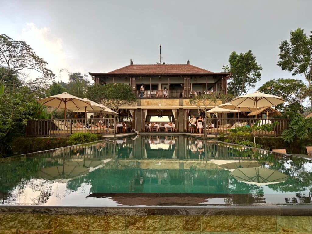 Munduk Moding Plantation Review: Multi-course romantic dinner spread at Munduk Moding Plantation Bali with artistically plated dishes on a candlelit table